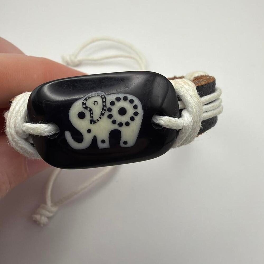 Black white elephant charm